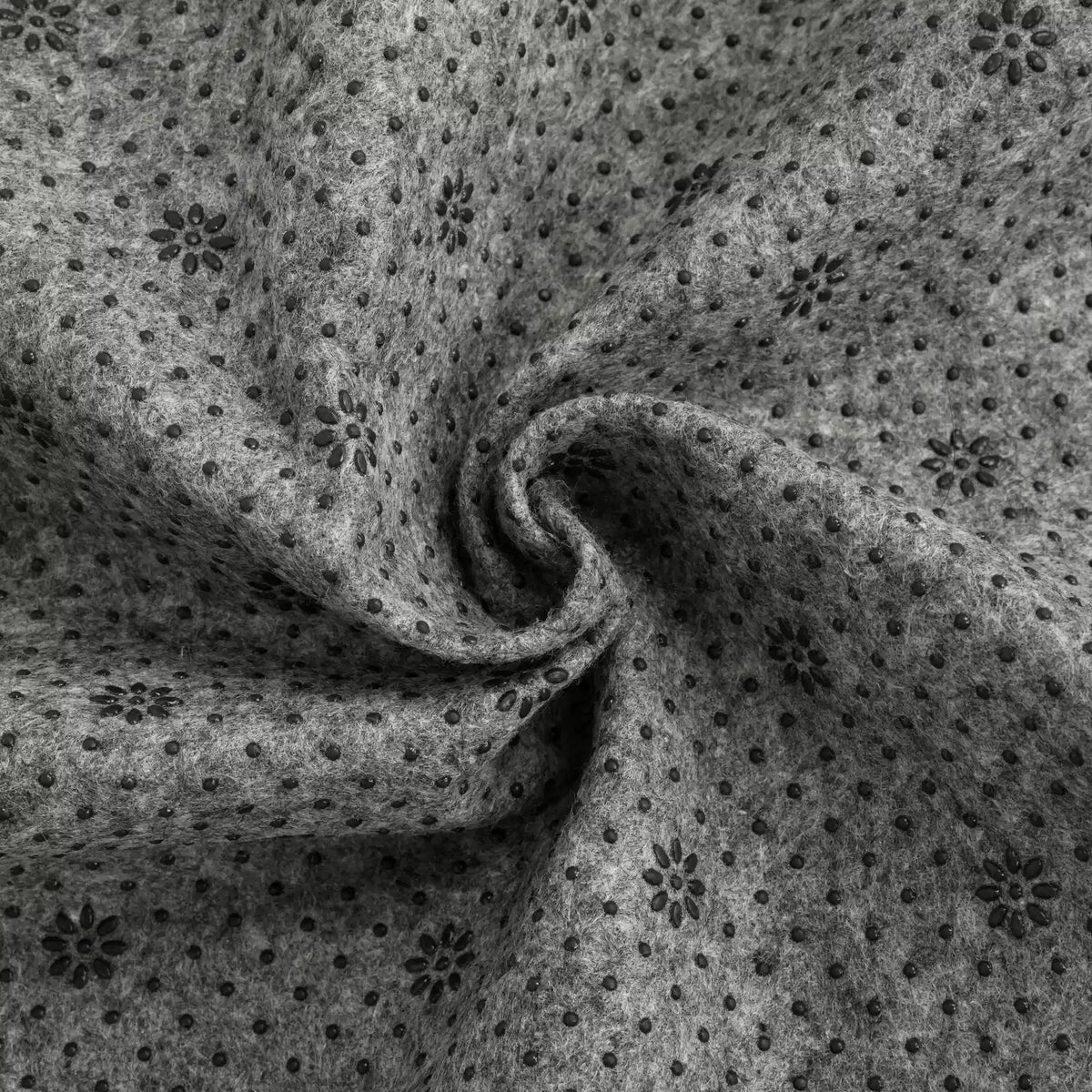 Tecido de base cinza Clawlab com pontos antiderrapantes e estampa floral.