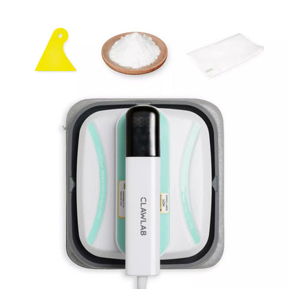 Clawlab heat press machine with yellow scraper, TPU powder, and silicone paper.